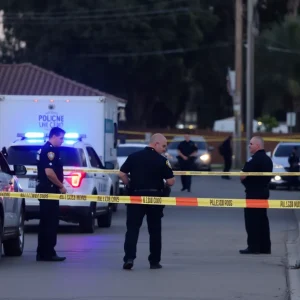 Police investigating a crime scene in Santa Ana